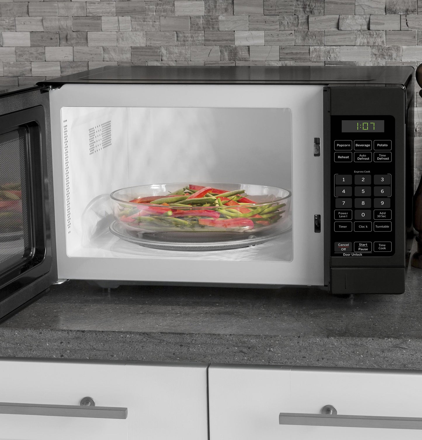 GE APPLIANCES GCST07N1WBB Ge 0.7 Cu. Ft. Capacity Countertop Microwave Oven